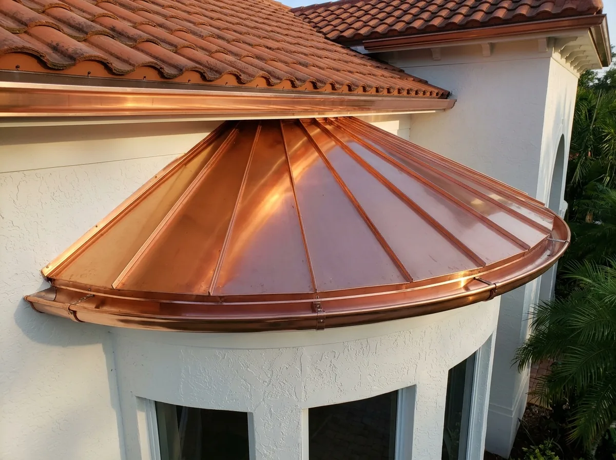 Curved bay-window roof finished in new copper standing seam panels